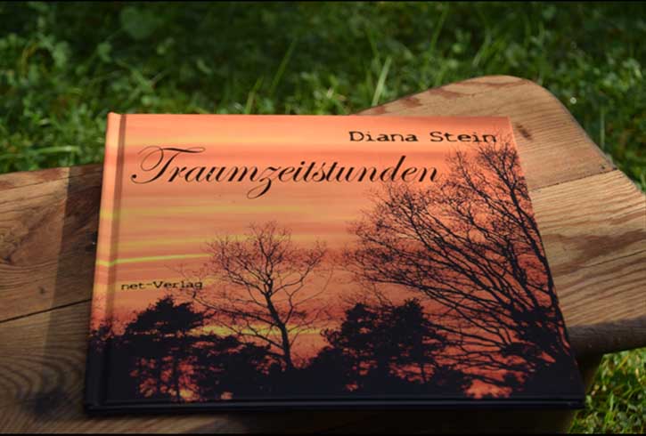 Buchcover Traumzeitstunden mit einem Sonnenuntergang